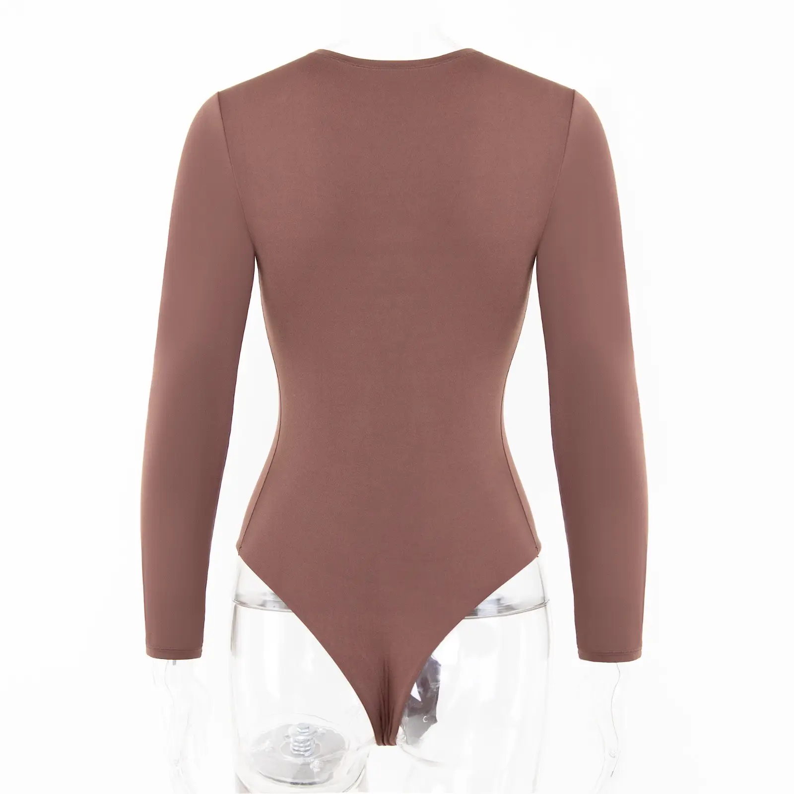 Back side of headless mannequin wearing a brown long sleeve bodysuit over a white background.