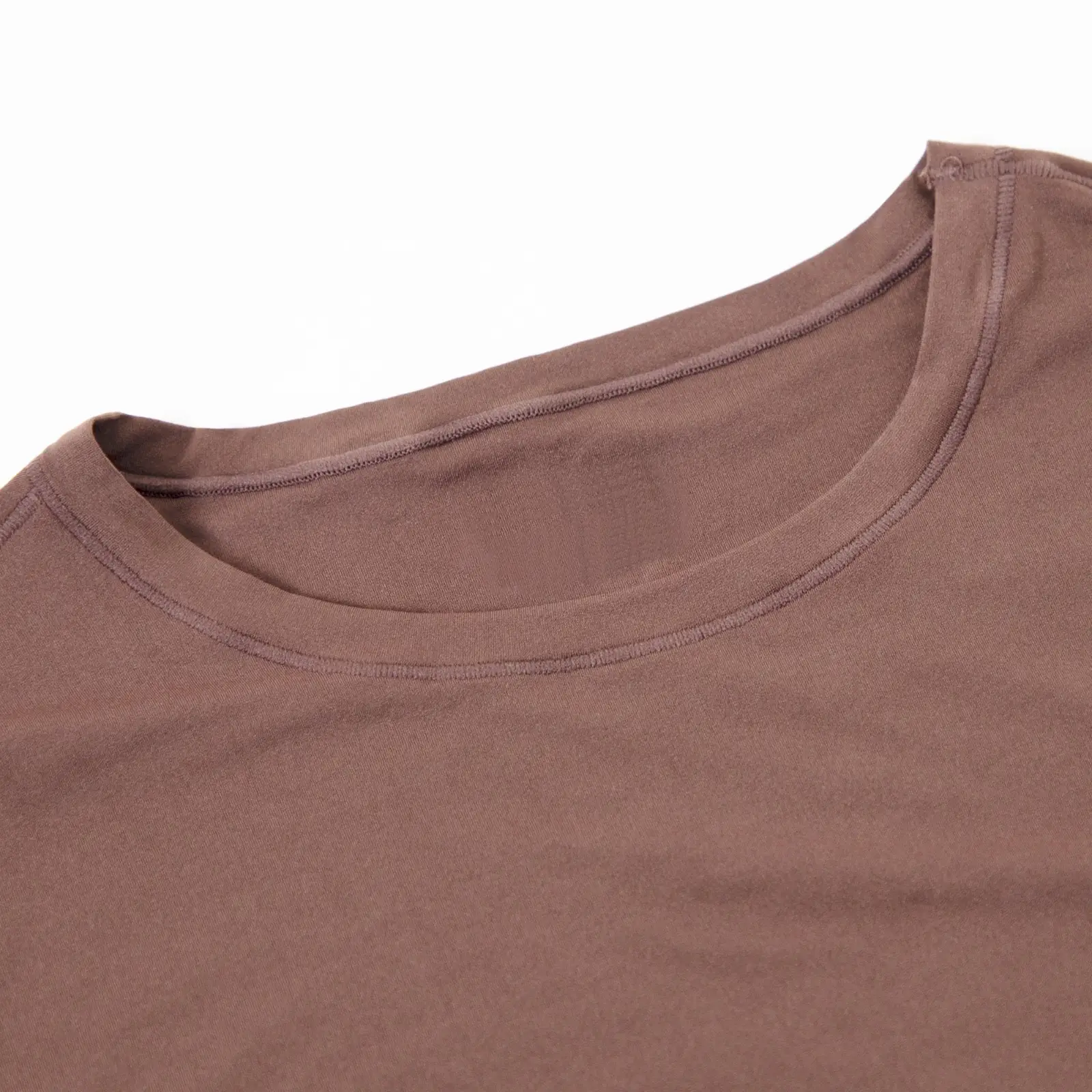 Close-up of brown long sleeve bodysuit crew neck.