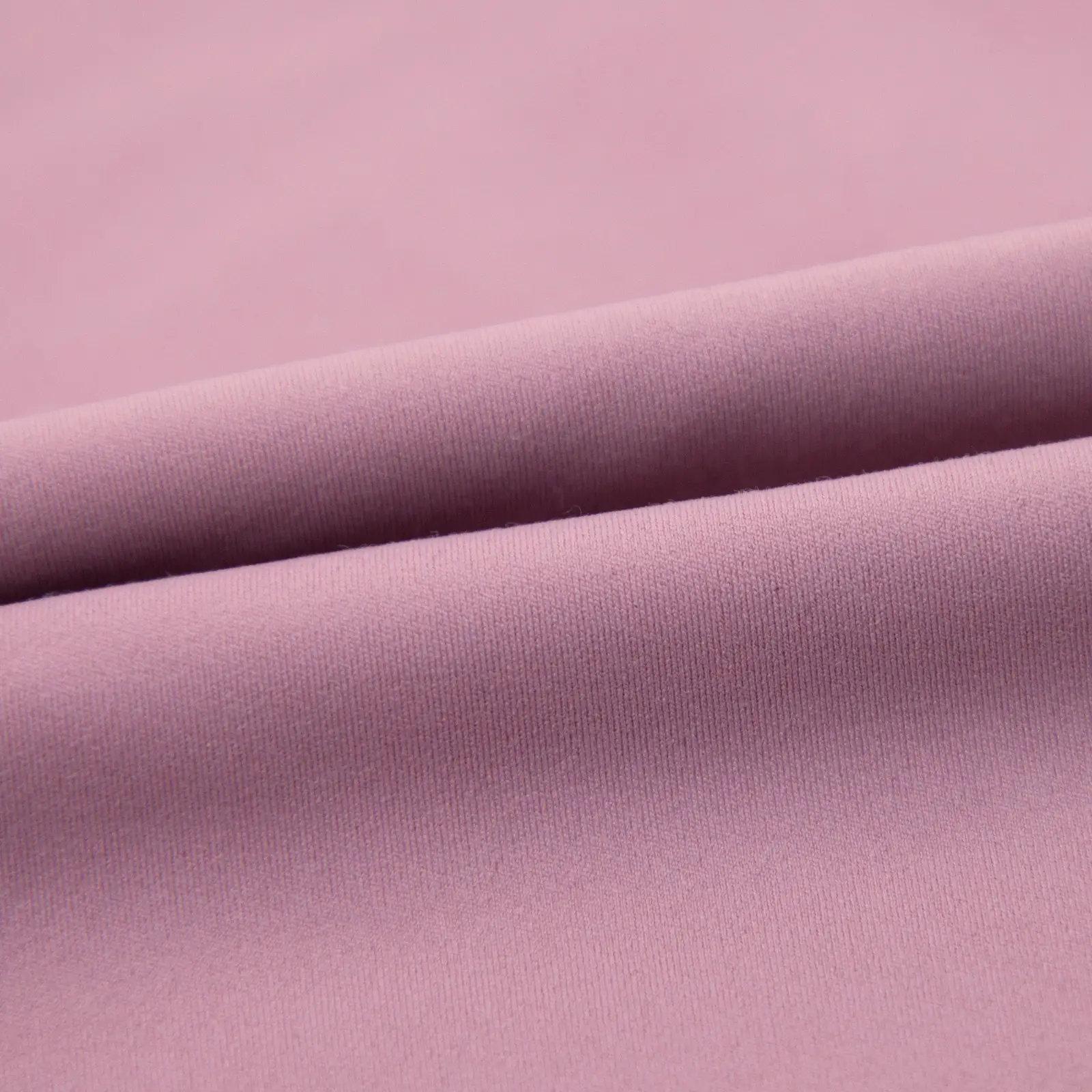 Close-up of folded light pink fabric